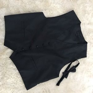 Tuxedo vest, tie, and bow tie.